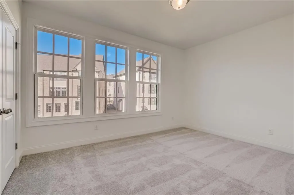 Private suite on upper level with upgrade carpet and pad. This room has great natural lighting also!