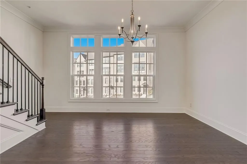 The Dining Room has gorgeous windows adding to the natural light in this home.