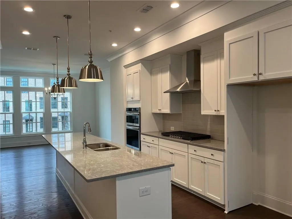 Entertain your guests on the central island with Pendant Lighting overhead!