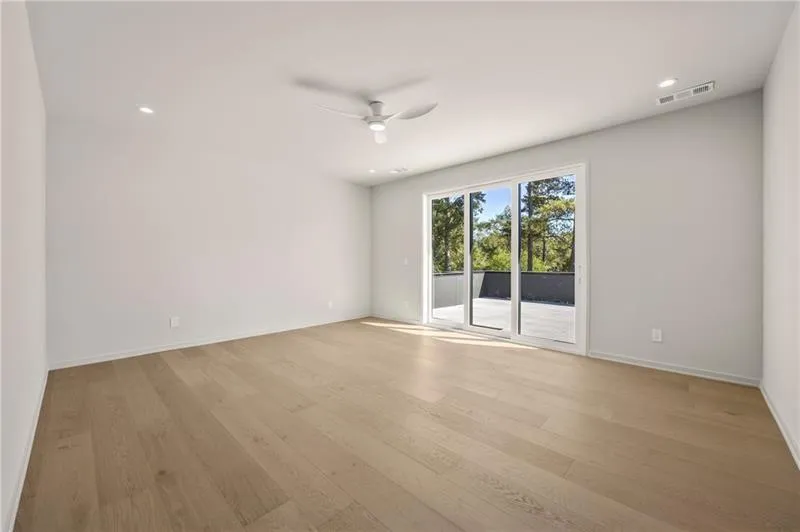 Spare room with light wood-type flooring, recessed lighting, and ceiling fan