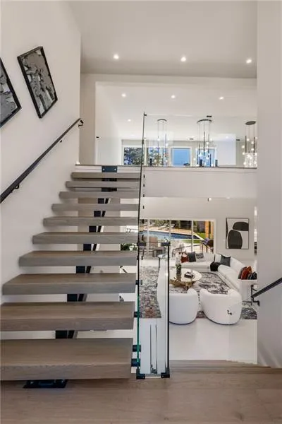 Floating Staircase with wood finished floors