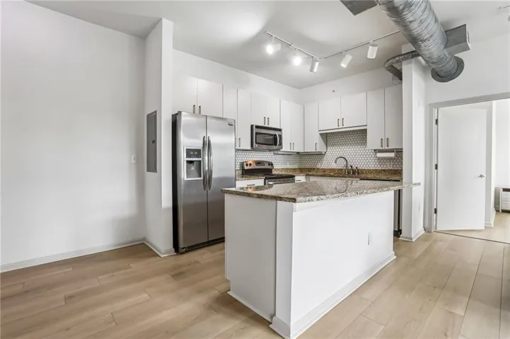 Updated Kitchen with Stainless Appliances- Fridge Included!