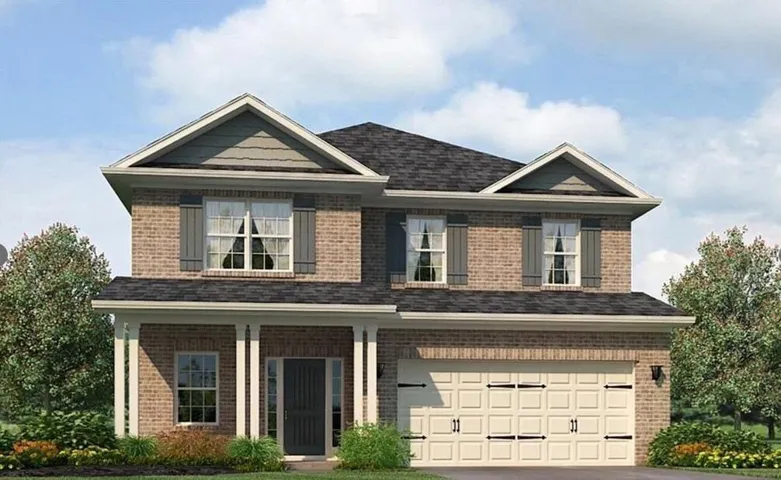 Brick exterior with an attached garage, covered entry, and dormer windows