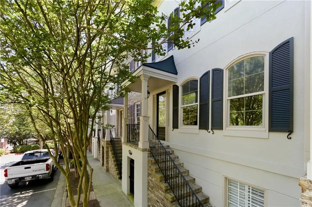 Property entrance with stucco siding