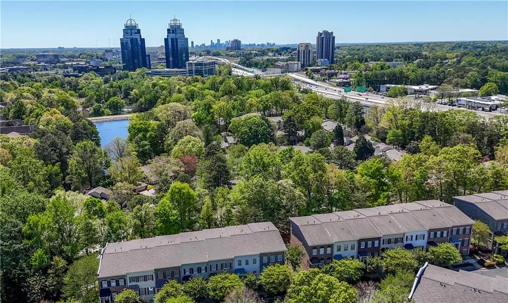 View of urban area featuring a tree filled landscape