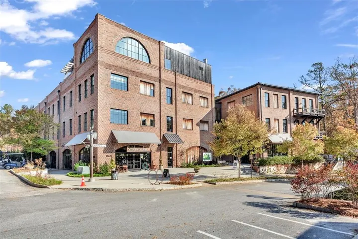 Brick facade building with an arched window accent