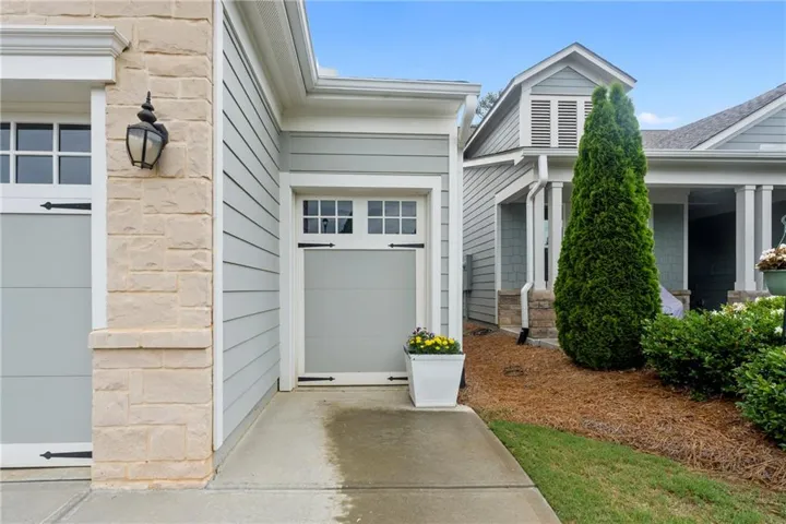 CYPRESS MODEL with the Golf Cart Garage option and an extended garage.