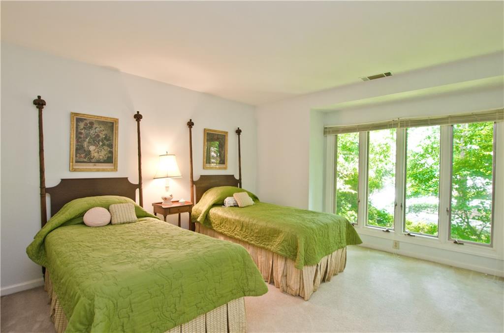 3rd bedroom upstairs with great windows