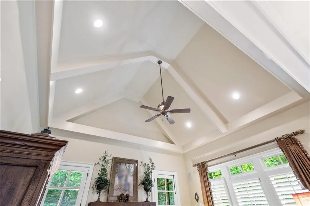 Detailed view of ceiling fan and beam ceiling