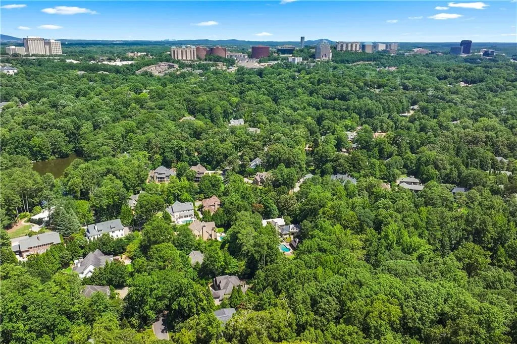 Drone / aerial view of a heavily wooded area