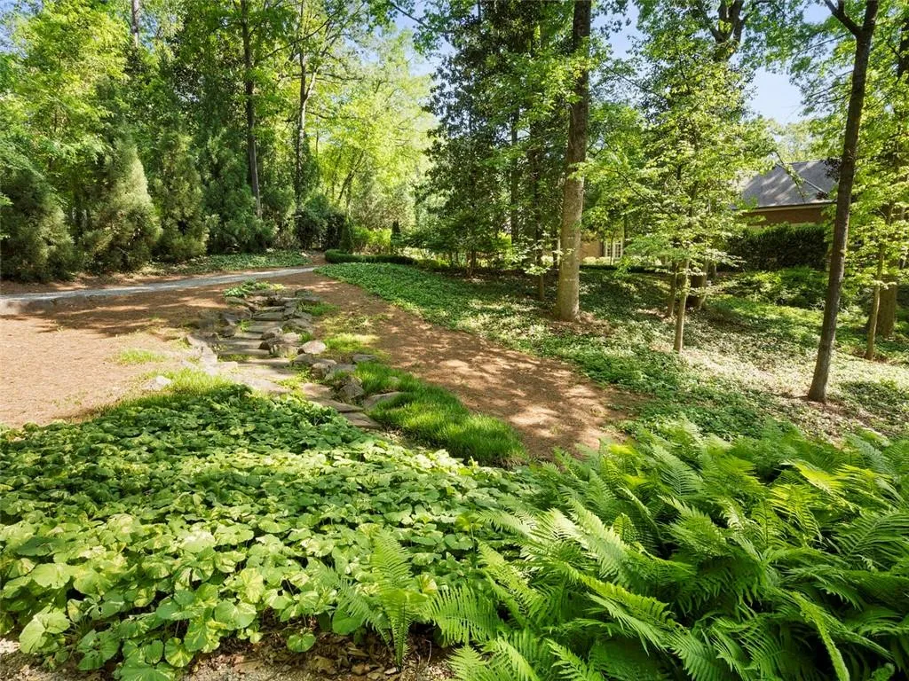 Perfect second entrance. Add more garages, guest house, tennis and pickleball.