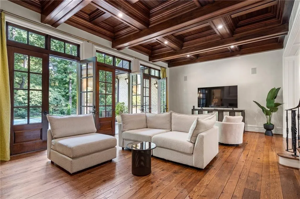 Gorgeous pool views from the living room and family room. 12 foot ceilings.