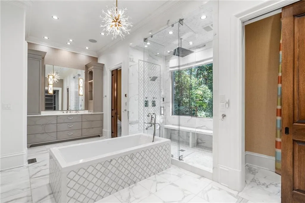 Separate vanities, dressing rooms and water closets.
