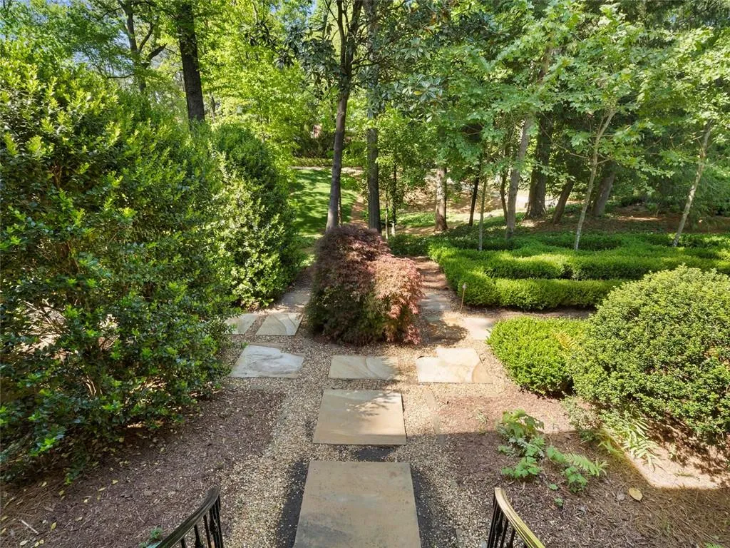 Walkway to the pool from the garages.