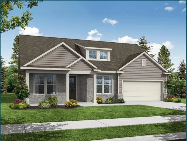 Contemporary residence featuring a light gray brick facade with complementary horizontal siding
