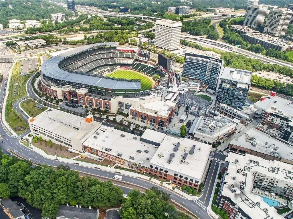 View of property location featuring a highway and nearby urban area