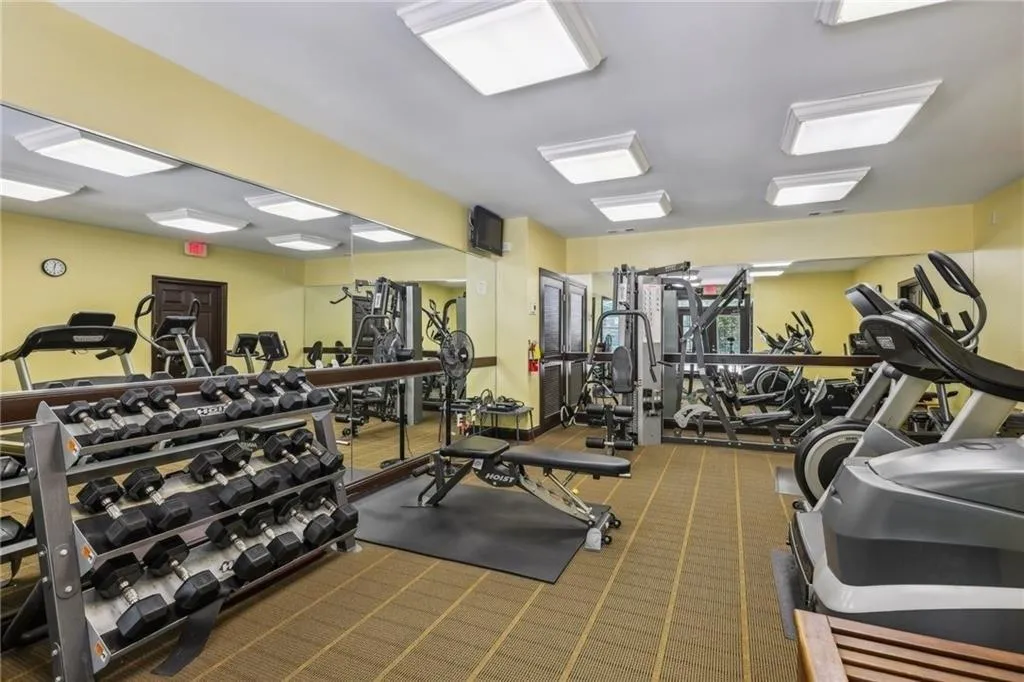 Exercise room featuring carpet flooring
