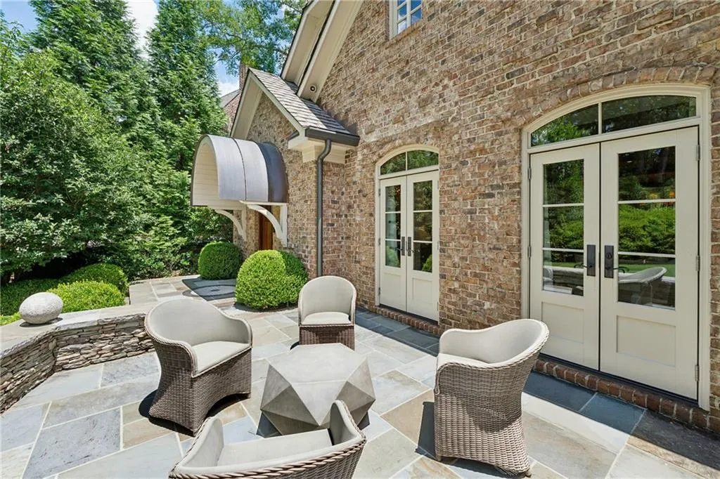 View of front entrance patio featuring french doors