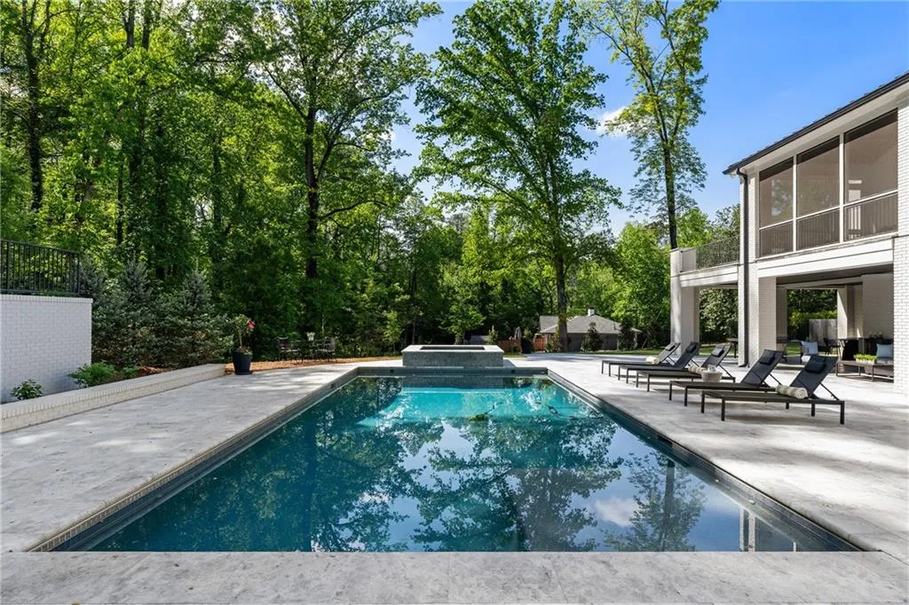 Large and deep Pebble Tec salt water heated pool and spa.