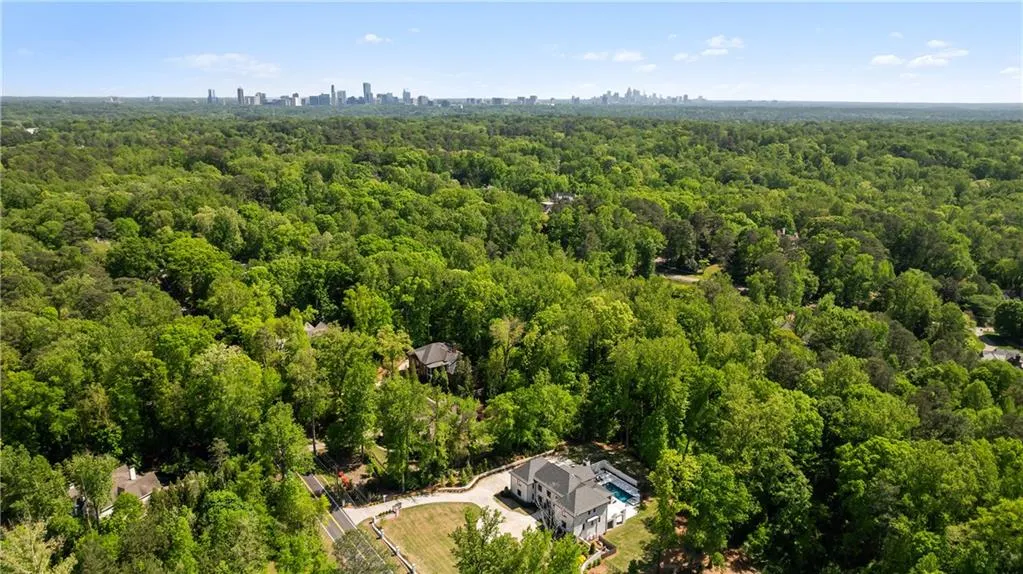 Nearly 6 acres of beautiful private tree-lined property