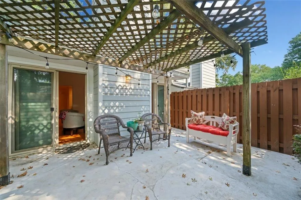 View of patio / terrace with an outdoor living space and a pergola