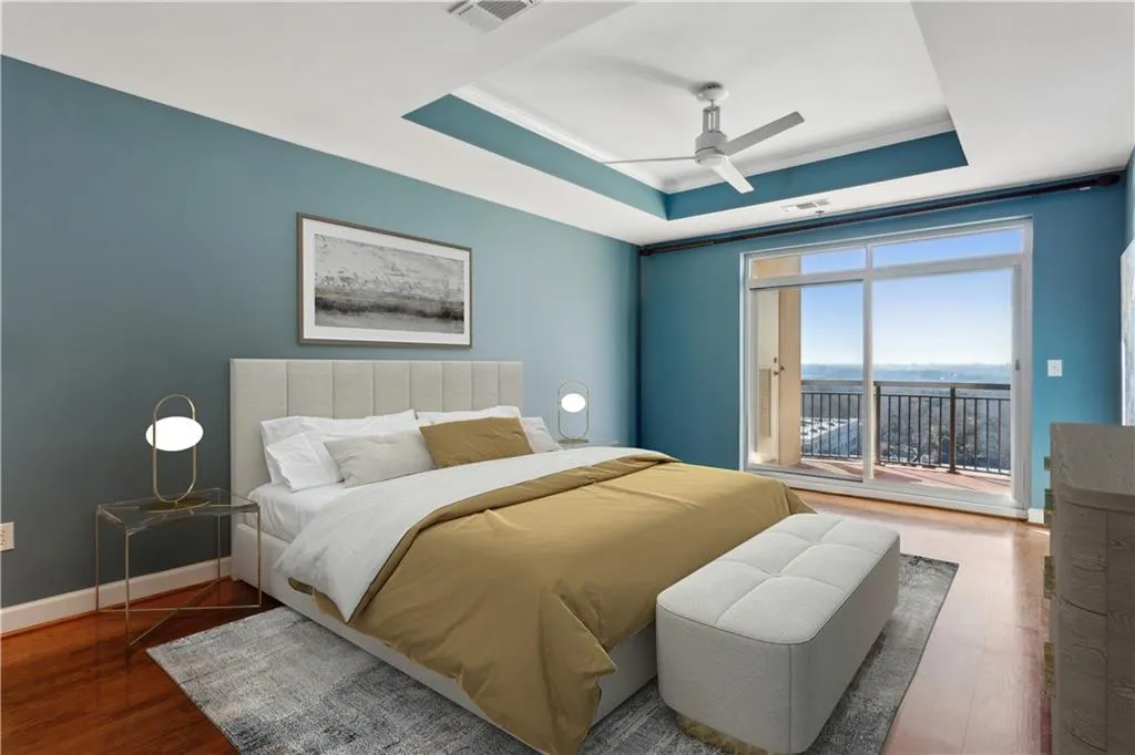 Primary bedroom with with private balcony