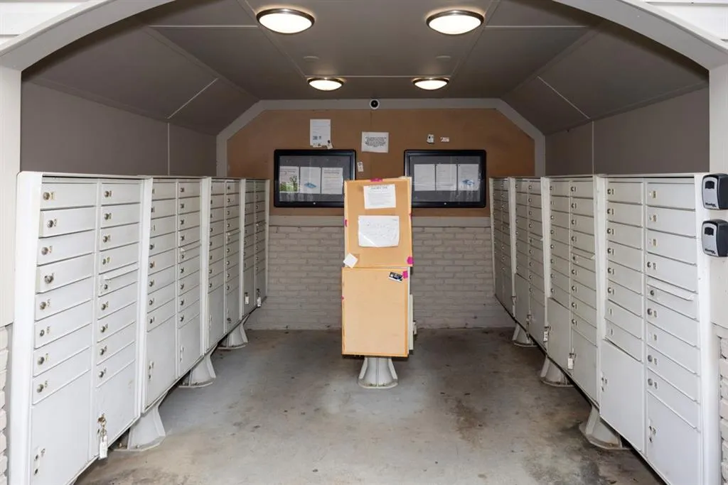 View of community featuring mail area
