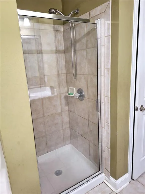 Primary Bath private glass-door showert.