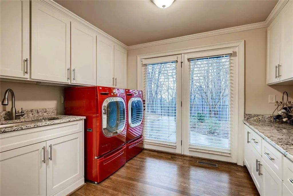 1925 Spalding Drive, Atlanta, Georgia 30350, 9 Bedrooms Bedrooms, ,6 BathroomsBathrooms,Residential,Sold,1925 Spalding Drive,6743719