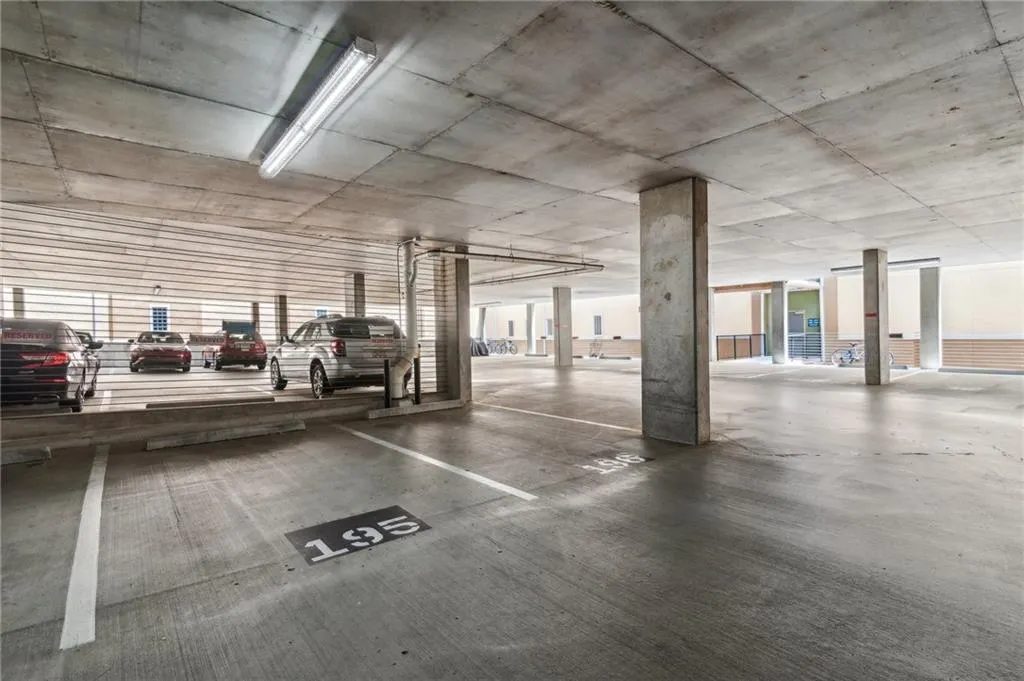 View of parking deck with assigned space- close to unit entrance
