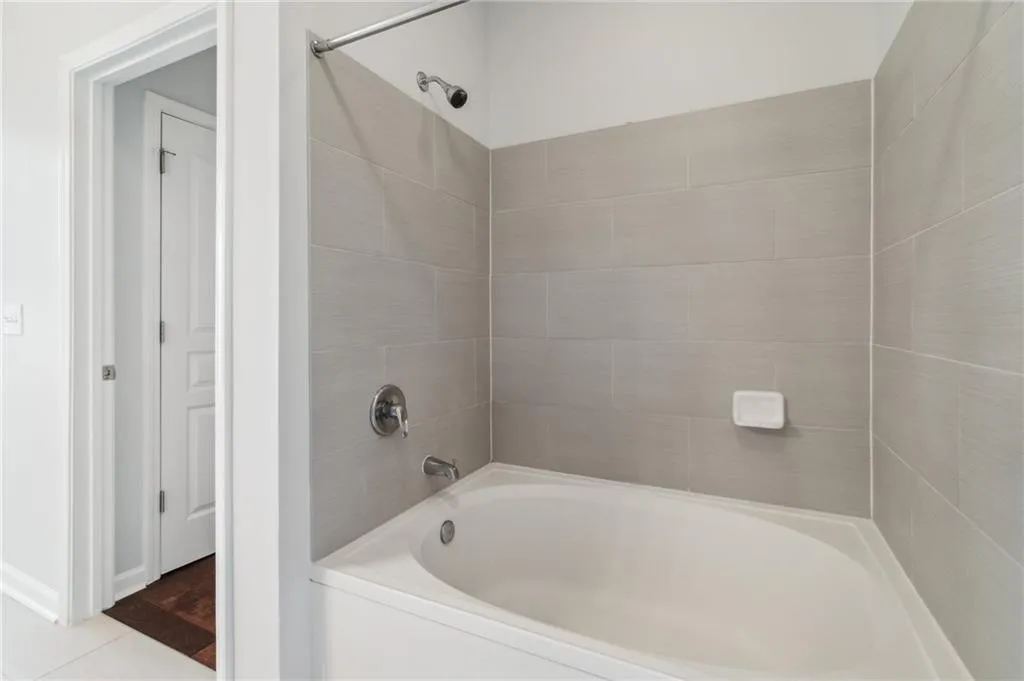 Full bath featuring shower / bathtub combination