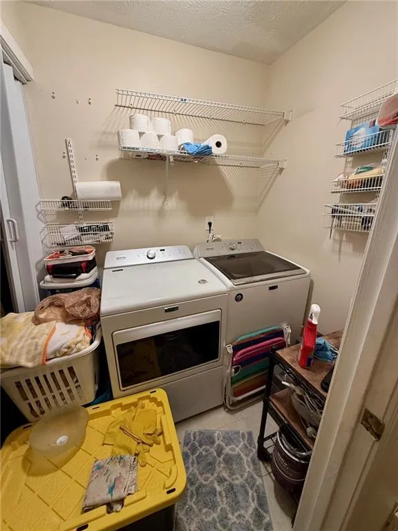 Dedicated laundry room with Full Size Washer & Dryer