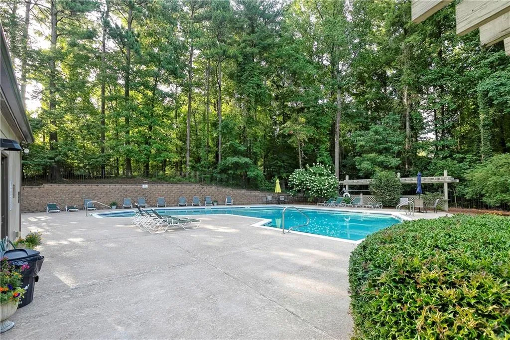 View of pool with a patio area