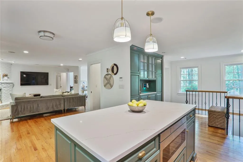 Kitchen featuring recessed lighting, wood finished floors