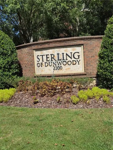 Brick entry monument with integrated signage