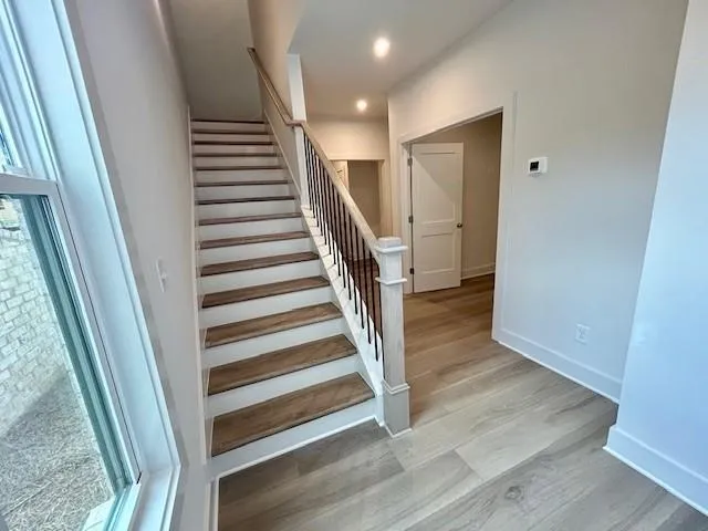 Lower level hallway leading to the garage