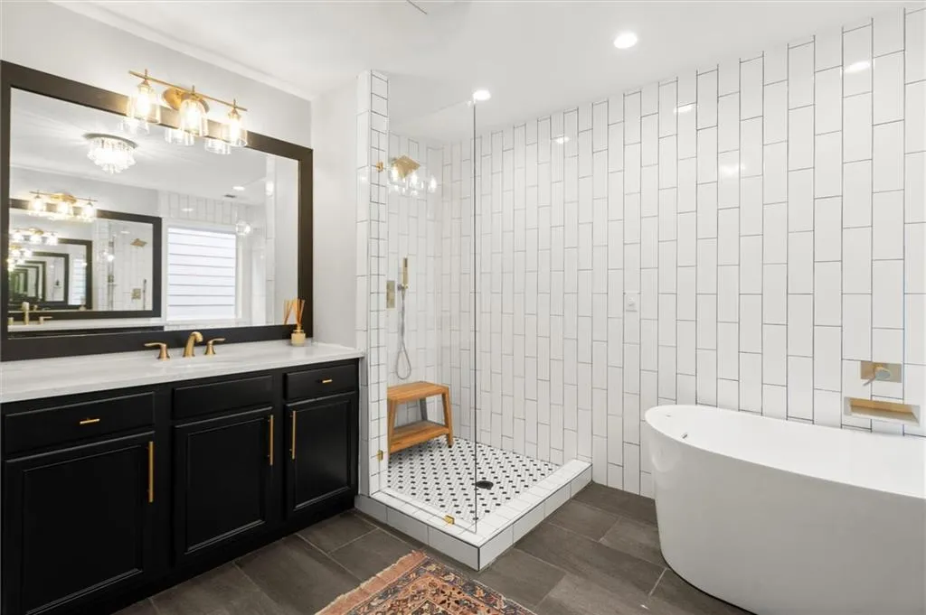 Second vanity and glass shower.