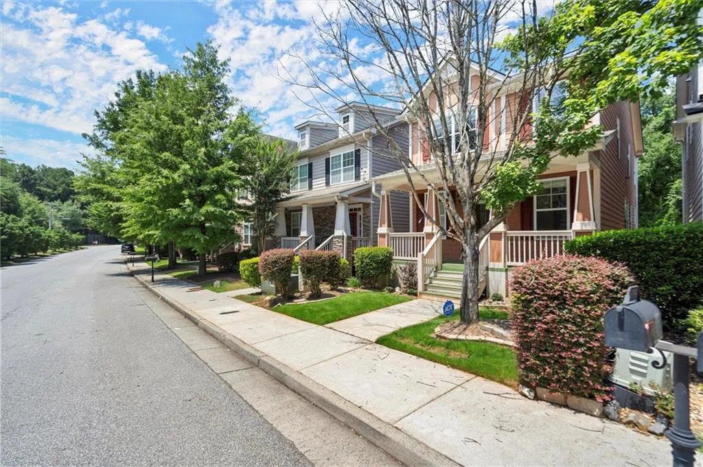 Wide neighborhood street with plenty of parking.