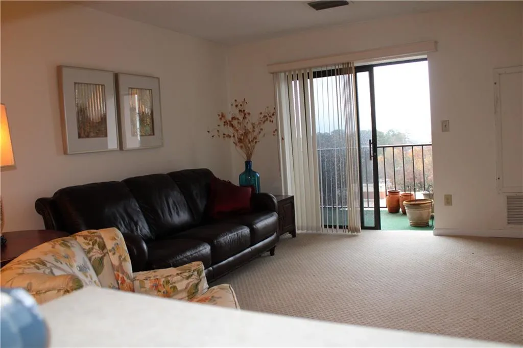 Living room with carpet. Living room with carpet.