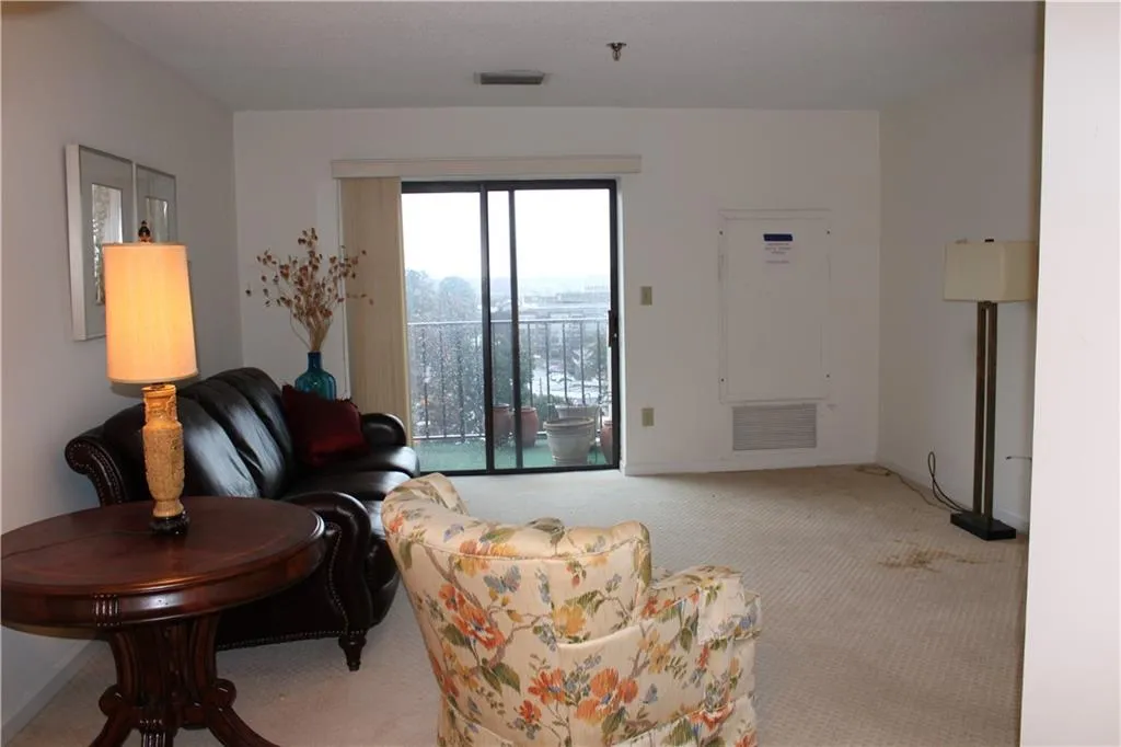 Carpeted living room. Carpeted living room.