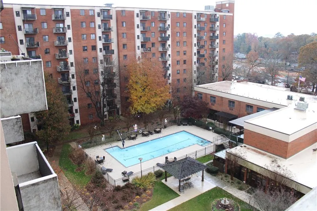 Community pool with a patio Community pool with a patio