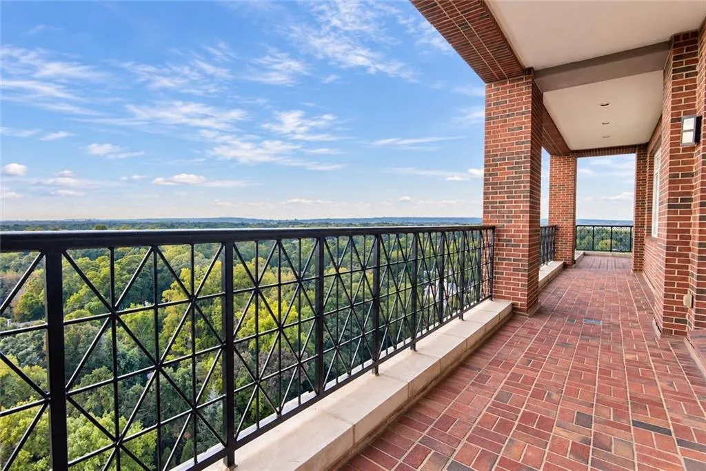 Brick-paved patio on the West-facing side that wraps around the Bedrooms