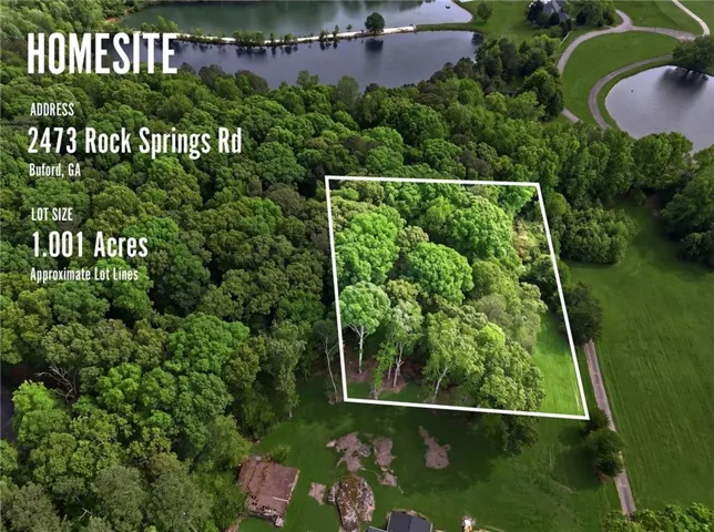 One-acre homesite featuring mature trees and lush greenery
