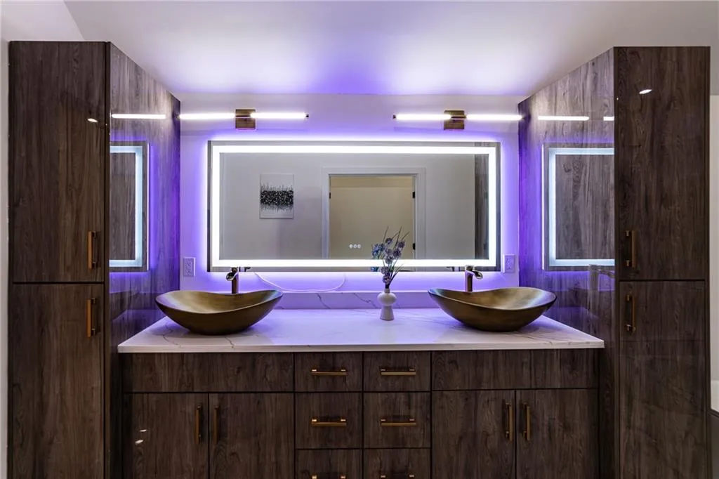 Full bathroom featuring double vanity