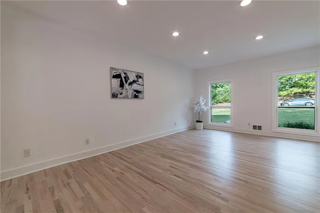 Unfurnished room featuring recessed lighting and light wood-style floors
