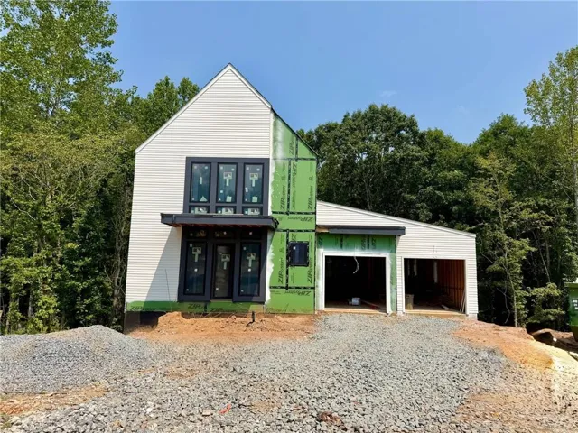 Impressive primary on the main home. 3-car tandem garage