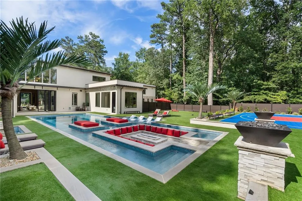 Sunken fire put inside pool with seating for 20