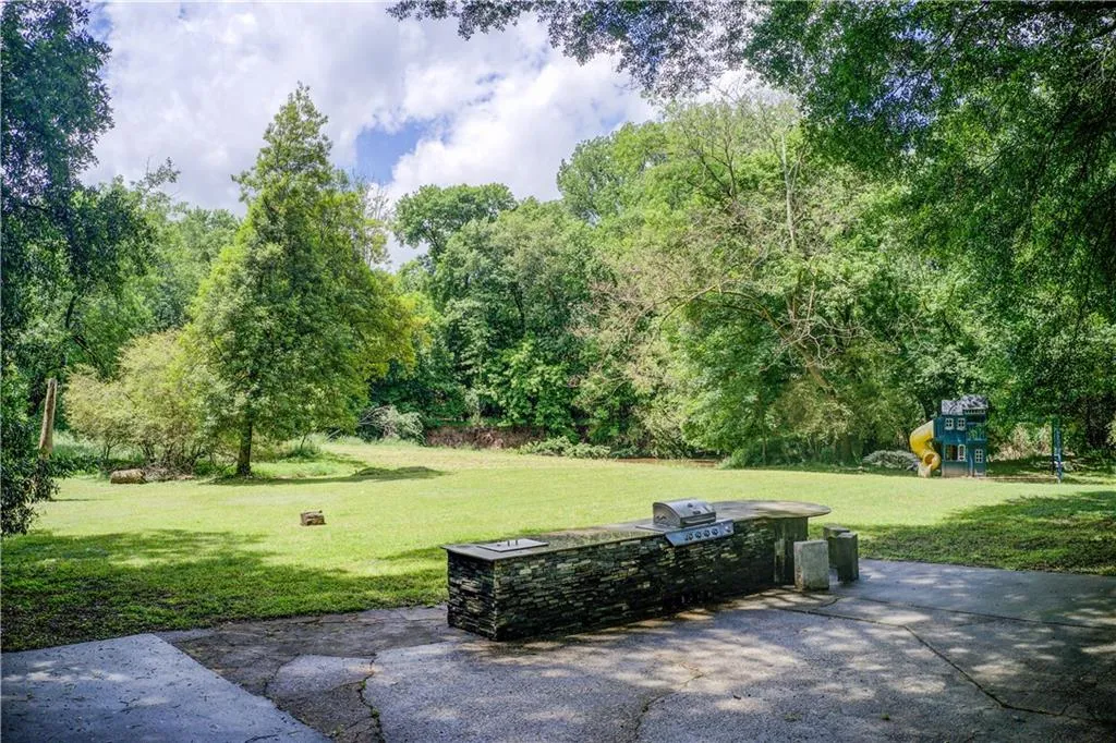View of patio featuring area for grilling