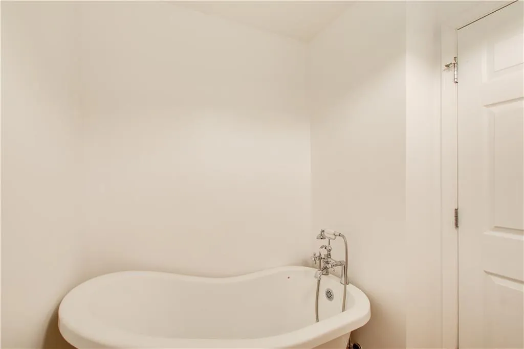 Full bath featuring a freestanding tub