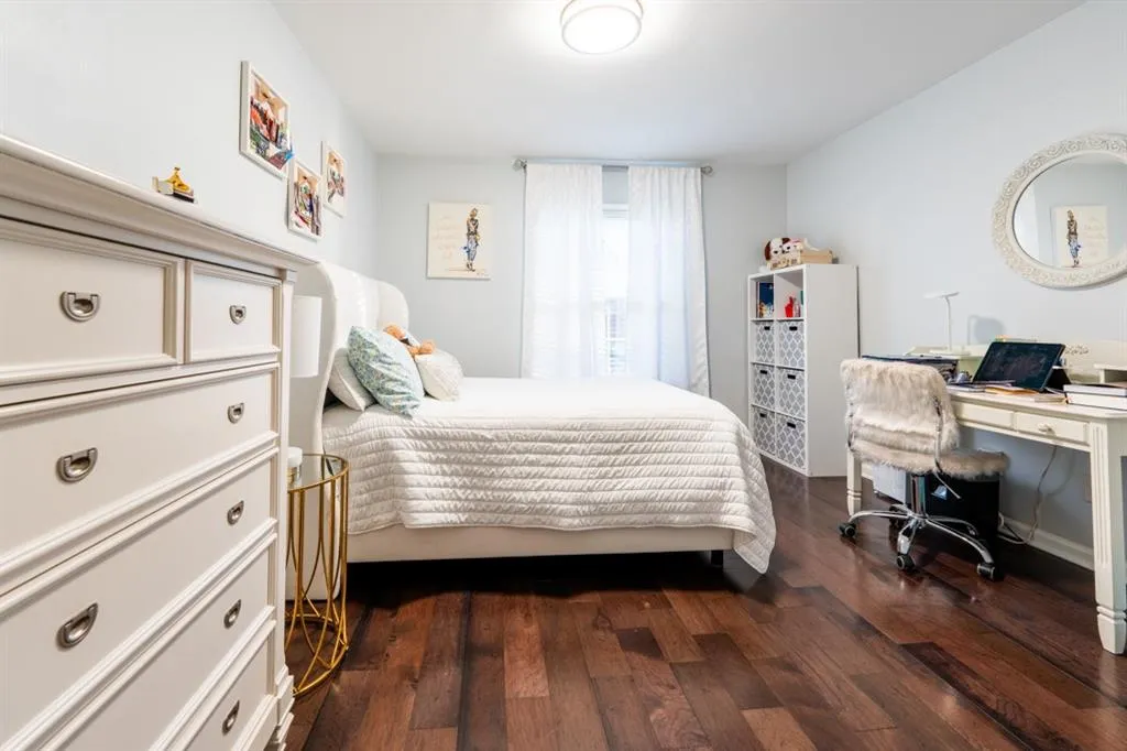 Guest Bedroom/Bedroom 2  featuring dark wood-style flooring